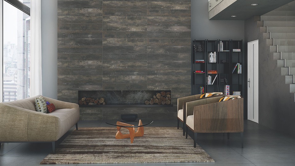 Neste ambiente, o porcelanato Eco Dark HD foi aplicado no detalhe da lareira. A aplicação garantiu um tom mais rústico a um ambiente com mobiliário e arquitetura moderna.
